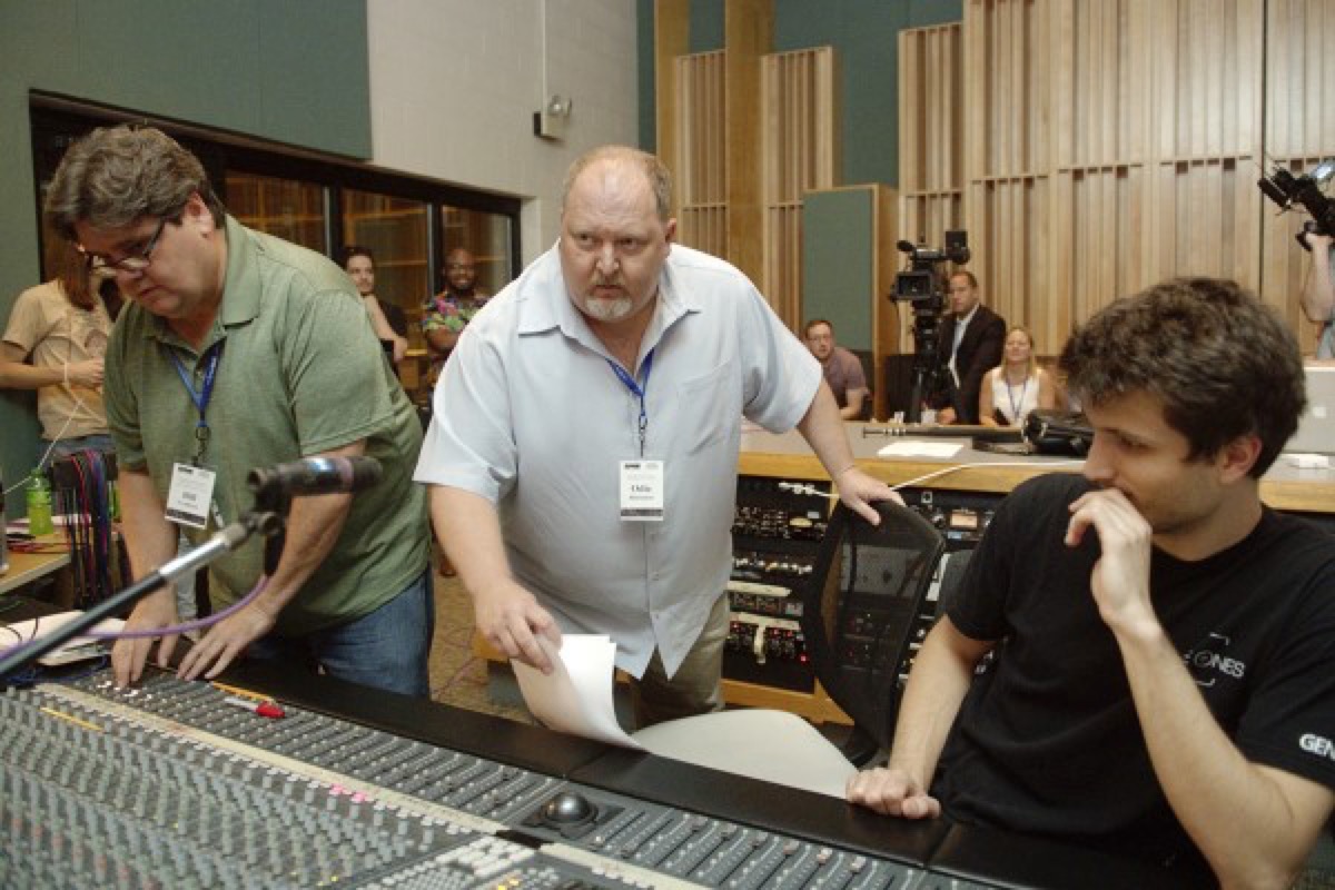 Odie Blackmon seated at a mixing console during a studio session.
